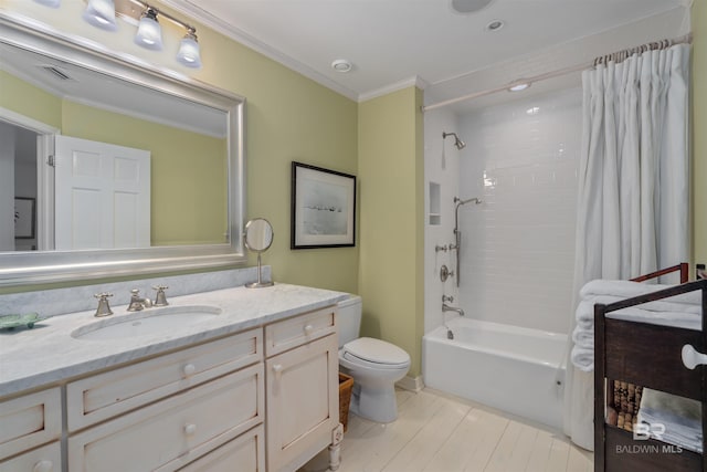 full bathroom featuring vanity, crown molding, shower / bath combo with shower curtain, and toilet