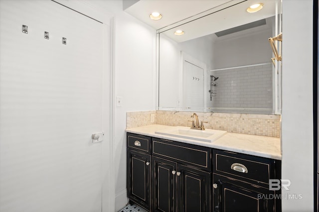 bathroom with vanity and backsplash