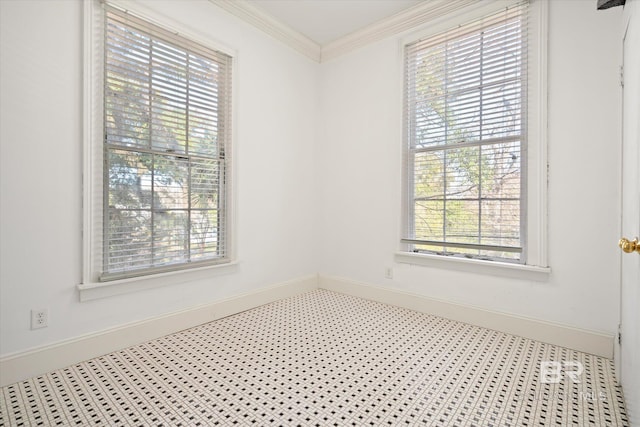 unfurnished room with ornamental molding and a wealth of natural light