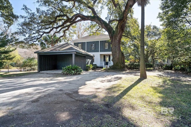 view of front of house featuring a carport