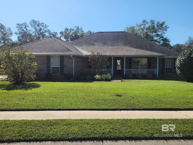 single story home with a front yard and a porch