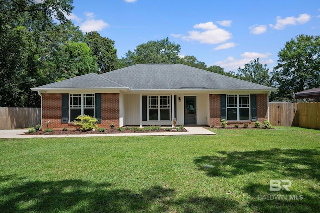 602 W 4th St, Bay Minette, AL 36507 - ranch-style home with brick siding and a shingled roof