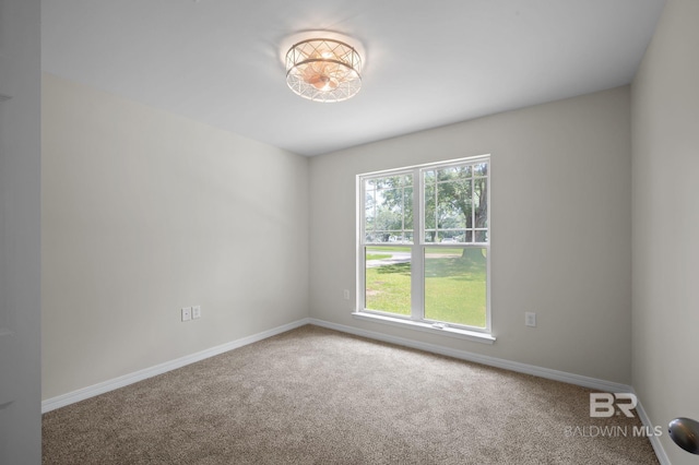 602 W 4th St, Bay Minette, AL 36507 - spare room with carpet floors and baseboards