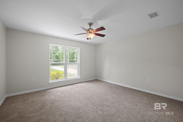 602 W 4th St, Bay Minette, AL 36507 - empty room with a ceiling fan, carpet, and baseboards