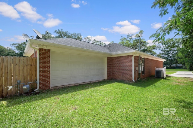 602 W 4th St, Bay Minette, AL 36507 - view of side of property with brick siding, central AC unit, a garage, and roof with shingles