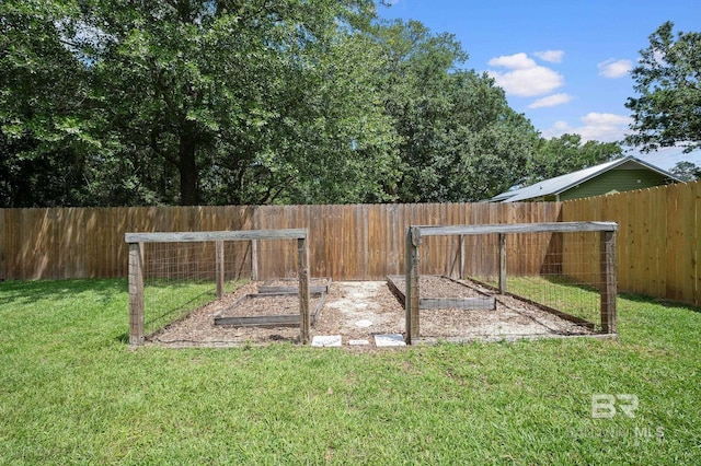 602 W 4th St, Bay Minette, AL 36507 - view of yard with a vegetable garden