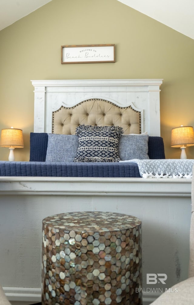 bedroom with vaulted ceiling