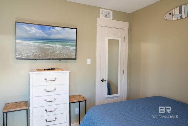 bedroom with visible vents