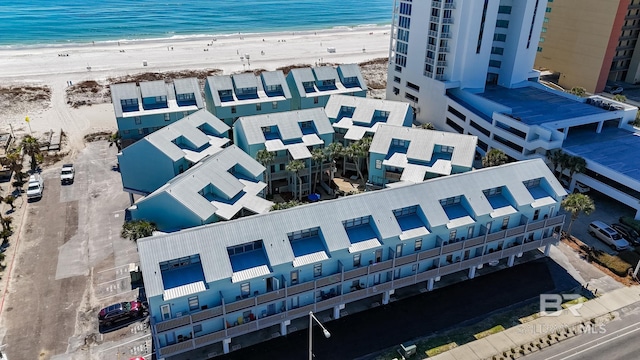 drone / aerial view with a view of the beach and a water view