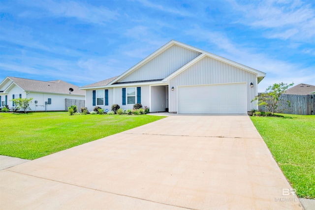 view of front of house with a garage and a front yard