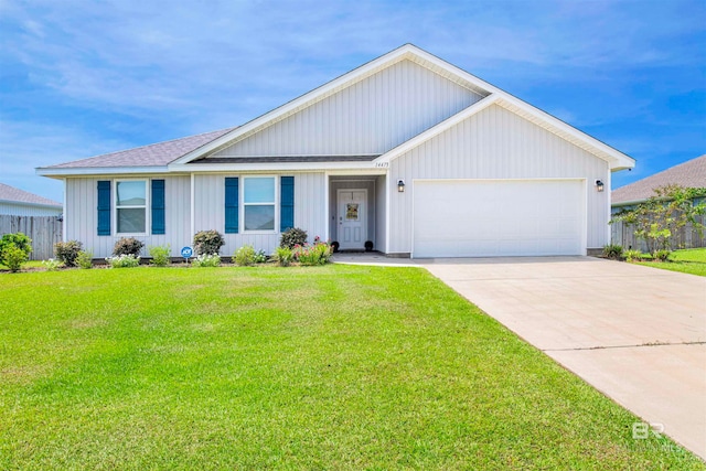 single story home with a garage and a front yard