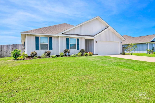 ranch-style house featuring a front lawn and a garage