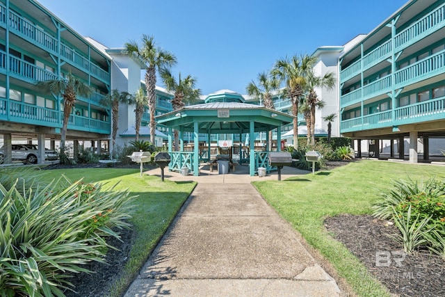 view of home's community featuring a gazebo and a yard