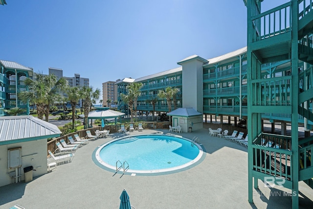 view of pool with a patio and a gazebo