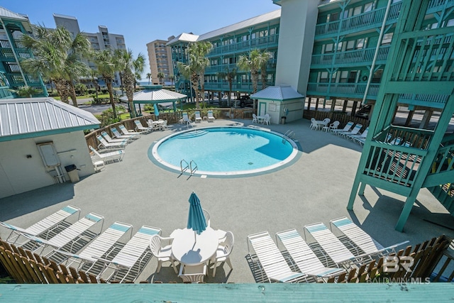 view of swimming pool featuring a patio