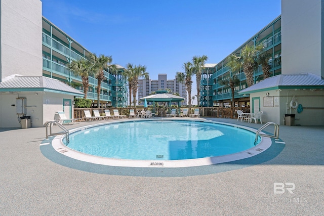 view of pool featuring a gazebo and a patio area