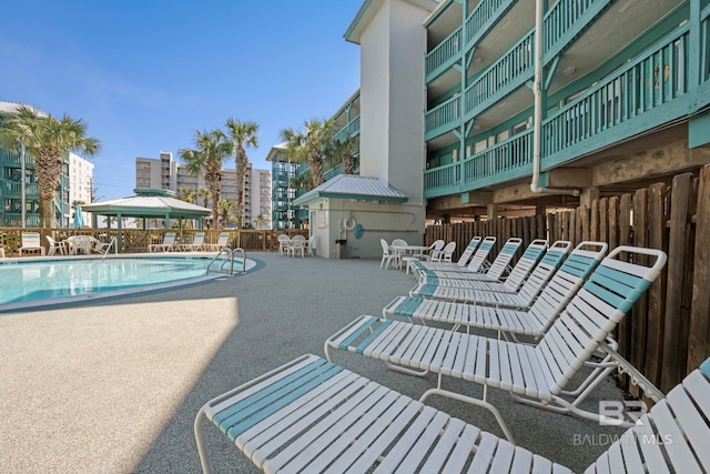 view of pool featuring a gazebo and a patio area