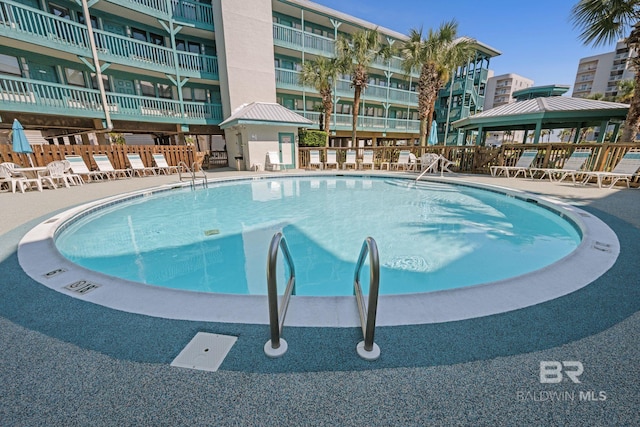 view of swimming pool with a gazebo