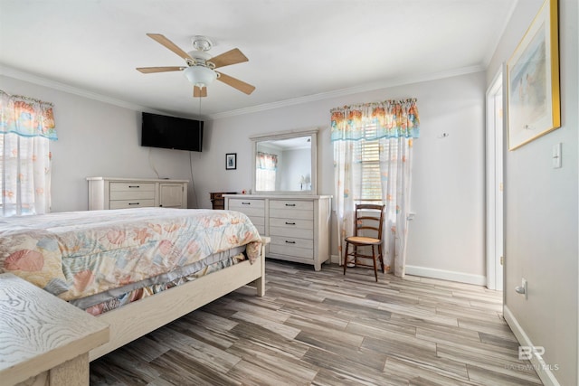 bedroom with crown molding, ceiling fan, and light wood-type flooring