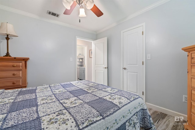 bedroom with ornamental molding, ceiling fan, and hardwood / wood-style floors