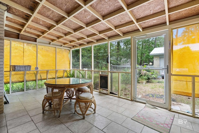 sunroom / solarium with lofted ceiling