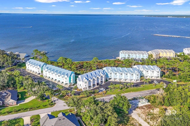 aerial view featuring a water view and a residential view