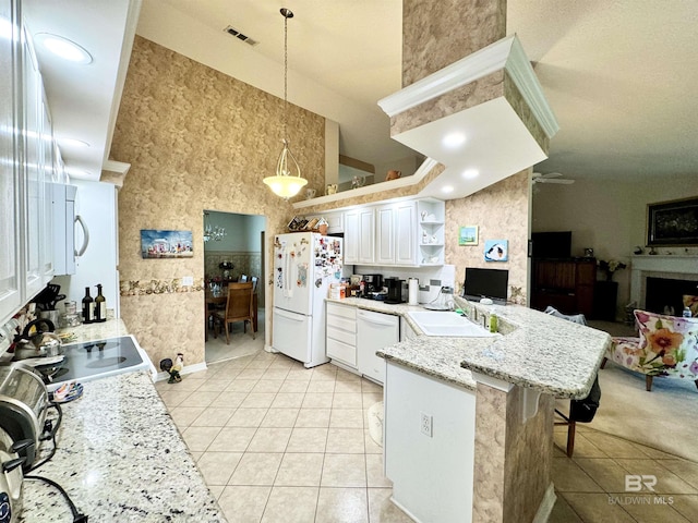 22835 County Road 12, Foley, AL 36535 - kitchen with white appliances, light tile patterned flooring, open shelves, a peninsula, and a sink