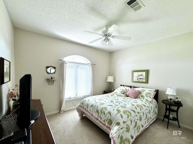 22835 County Road 12, Foley, AL 36535 - bedroom with carpet floors, ceiling fan, baseboards, and a textured ceiling