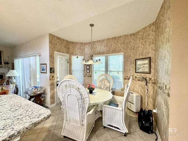 22835 County Road 12, Foley, AL 36535 - dining room with light tile patterned flooring and a chandelier
