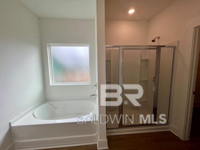 bathroom with independent shower and bath