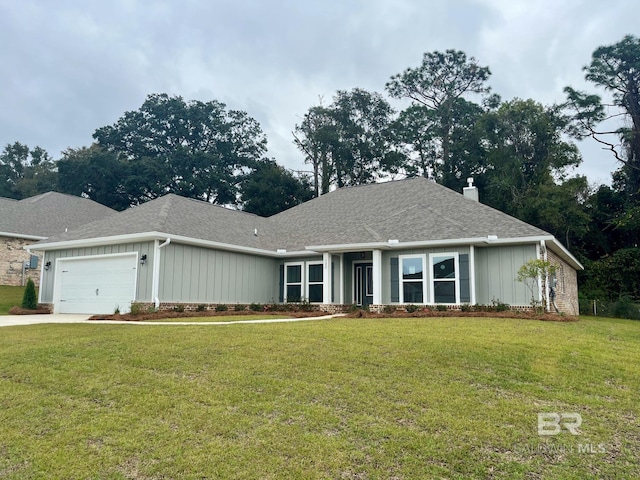 ranch-style home with a front lawn and a garage