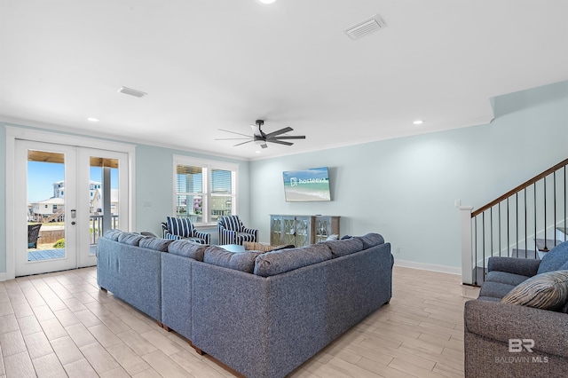 1337 W Lagoon Ave, Gulf Shores, AL 36542 - living area featuring baseboards, visible vents, light wood-style flooring, and a ceiling fan