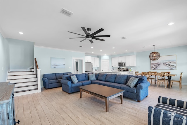 1337 W Lagoon Ave, Gulf Shores, AL 36542 - living area with light wood finished floors, visible vents, recessed lighting, and a ceiling fan