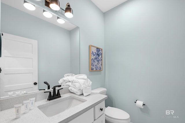 1337 W Lagoon Ave, Gulf Shores, AL 36542 - bathroom featuring toilet and vanity