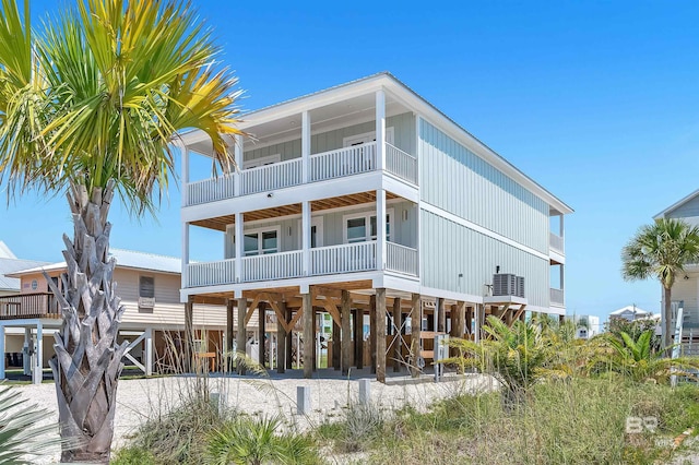 1337 W Lagoon Ave, Gulf Shores, AL 36542 - back of house featuring a carport