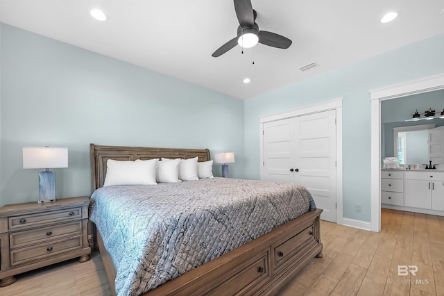 1337 W Lagoon Ave, Gulf Shores, AL 36542 - bedroom with a sink, visible vents, a closet, and light wood-type flooring