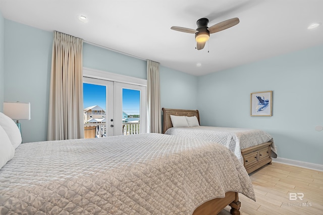 1337 W Lagoon Ave, Gulf Shores, AL 36542 - bedroom with baseboards, ceiling fan, access to outside, wood finished floors, and french doors
