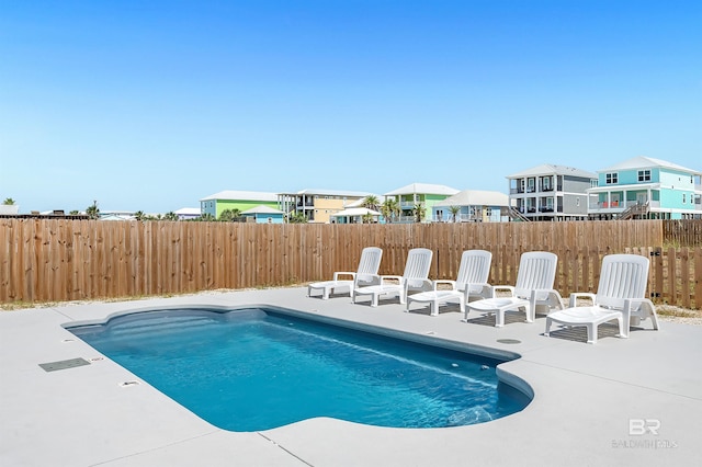 1337 W Lagoon Ave, Gulf Shores, AL 36542 - view of swimming pool featuring a fenced in pool, a fenced backyard, and a patio area
