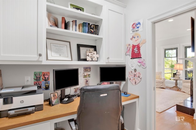 office space with hardwood / wood-style flooring