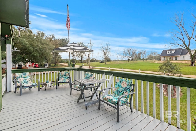 wooden deck with a yard