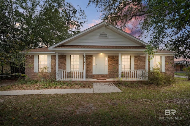 view of front of home featuring covered porch