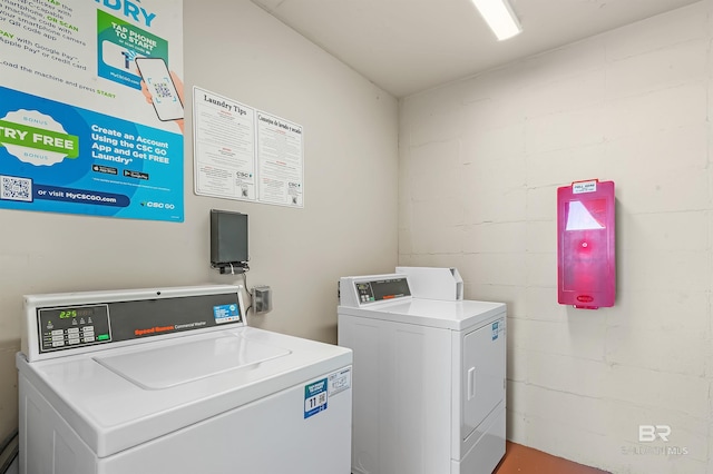 laundry room featuring separate washer and dryer