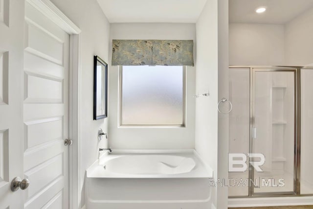 11569 Thistledown Loop, Spanish Fort, AL 36527 - full bathroom featuring a shower stall and a bath