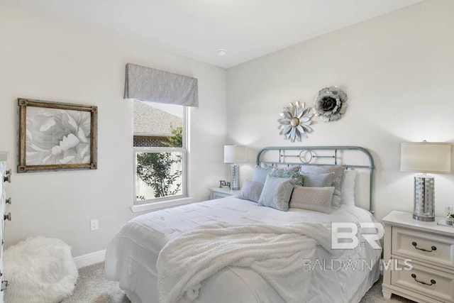 11569 Thistledown Loop, Spanish Fort, AL 36527 - bedroom featuring light carpet and baseboards