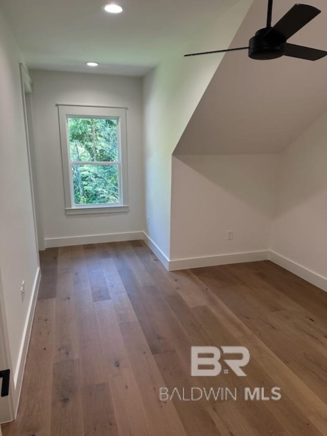 bonus room with ceiling fan and light hardwood / wood-style flooring