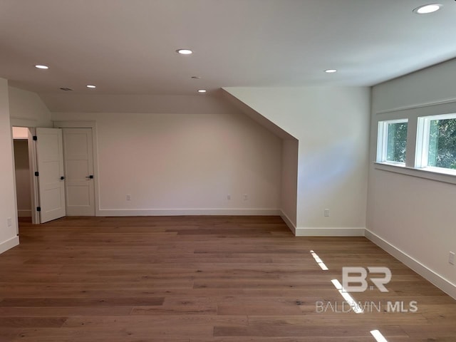 bonus room featuring wood-type flooring