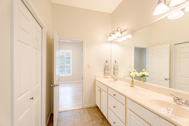 bathroom featuring tile patterned floors and vanity