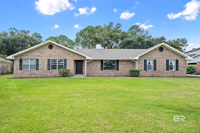 single story home with a front yard