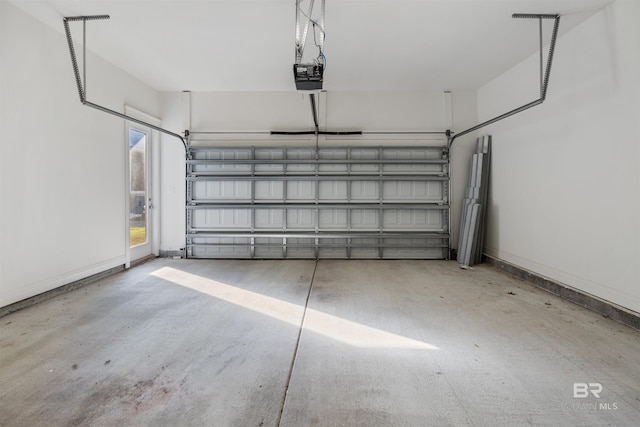 garage featuring a garage door opener