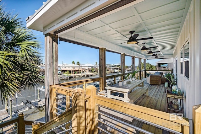 deck featuring a water view